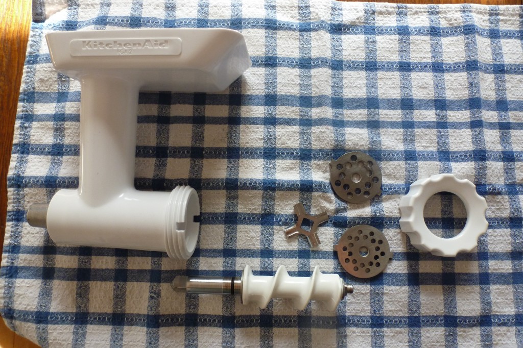 The body, worm, blade, plates, and collar of the Kitchen Aid grinder attachment