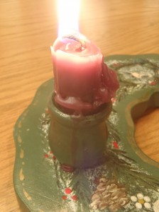 A candle on an Advent wreath