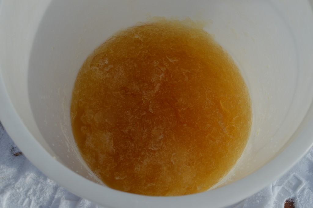 The frozen apple cider is broken up to make this slushy mixture