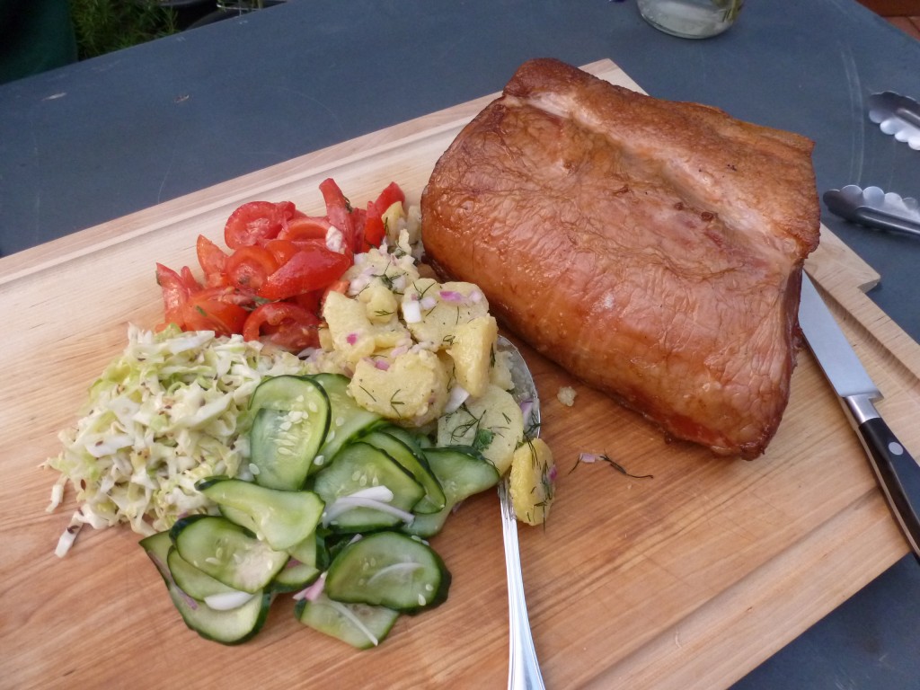 The loin and salads on serving board