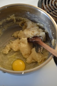 Beating the eggs into choux pastry