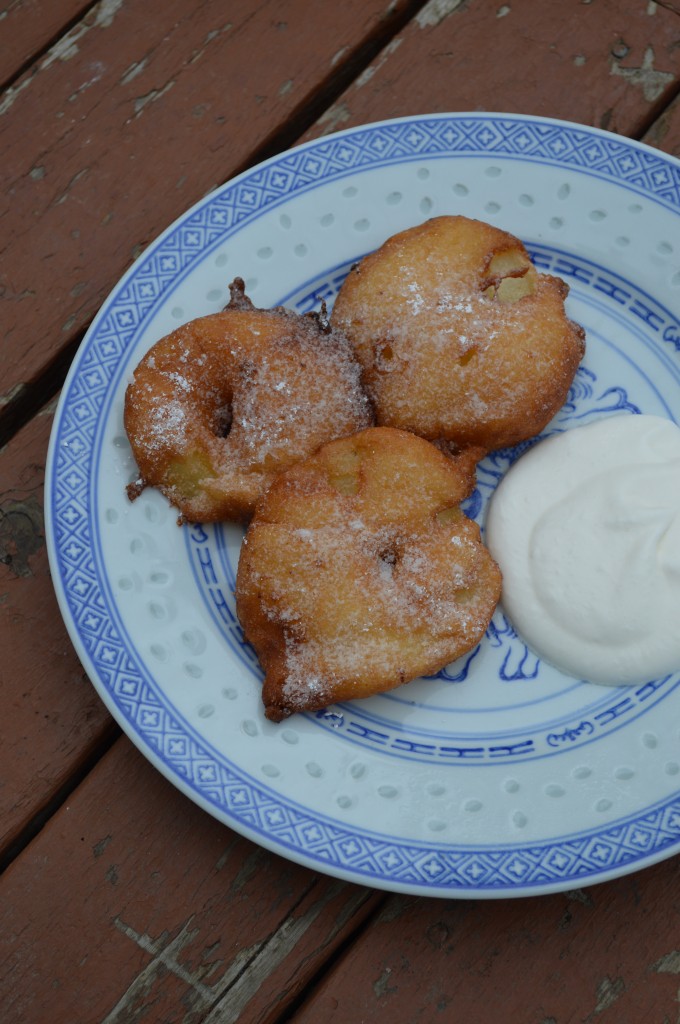 Apple fritters with whipped cream