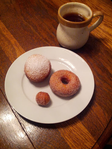 Homemade doughnuts: jelly-filled, cinnamon sugar, and a doughnut hole