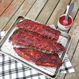 Pork ribs glazed with sour cherry barbecue sauce.