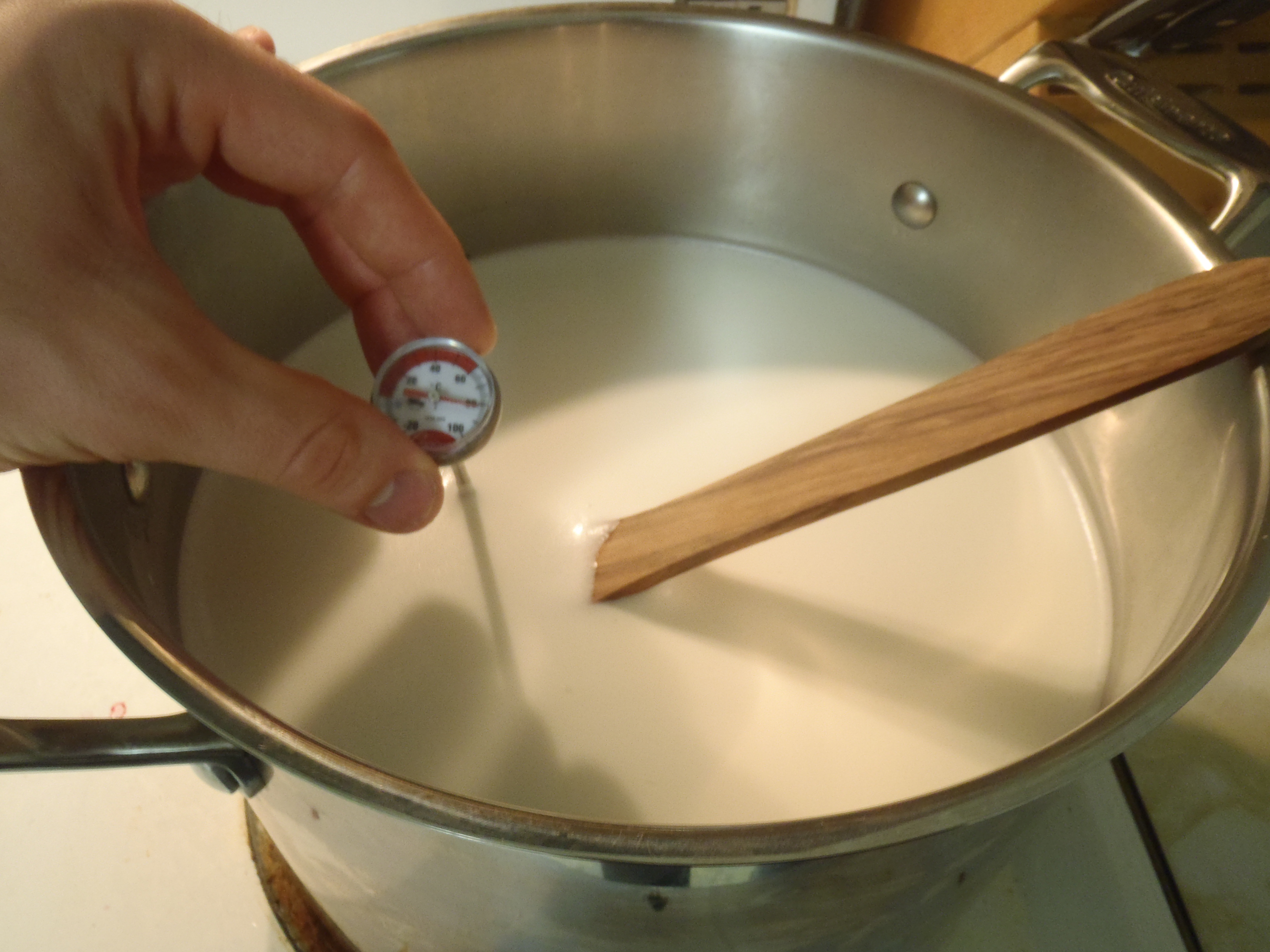 Heating the milk to make yogurt