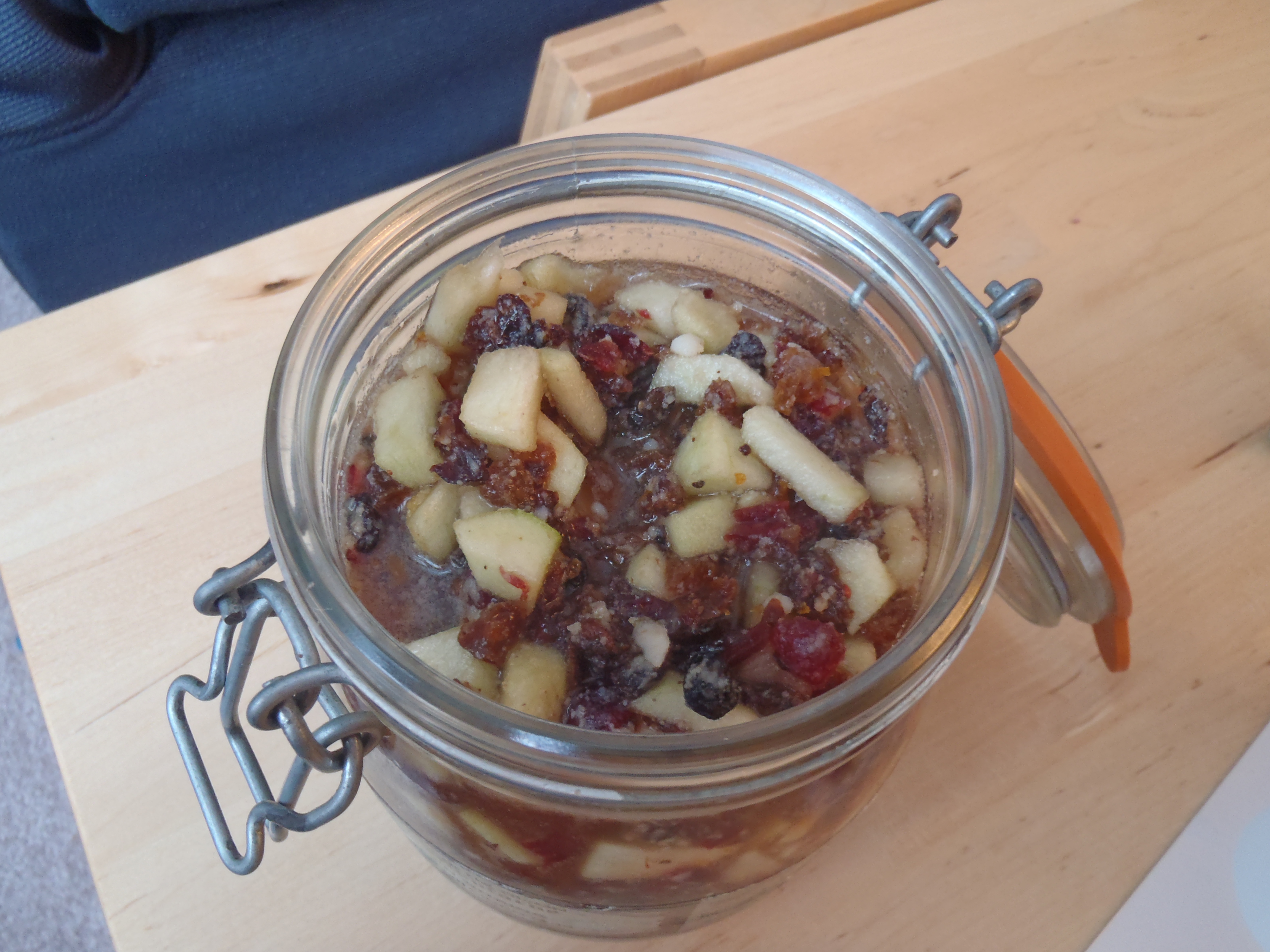 A jar of mincemeat, reading to age in the fridge