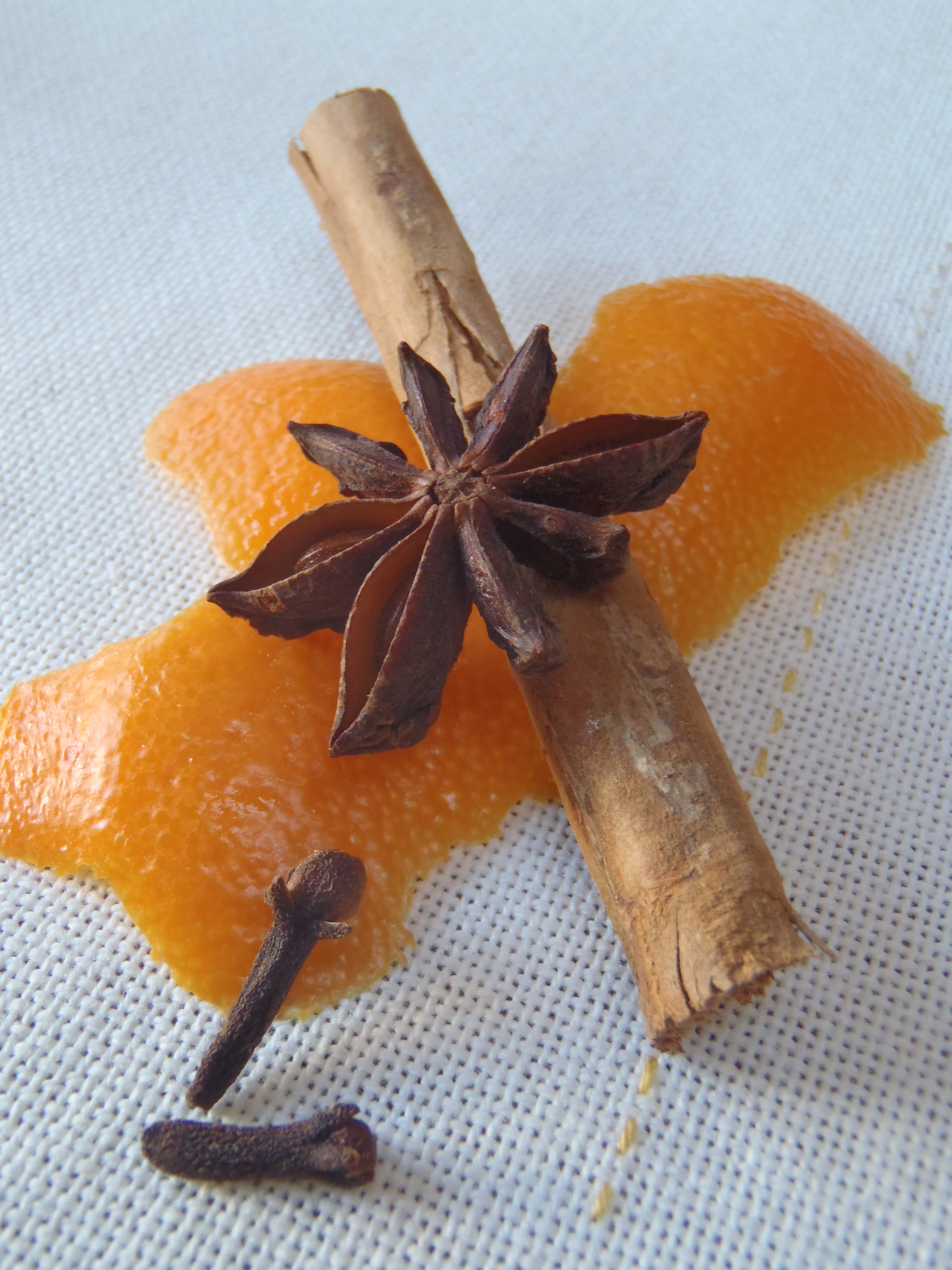 Orange peel, clove, cinnamon, and star anise