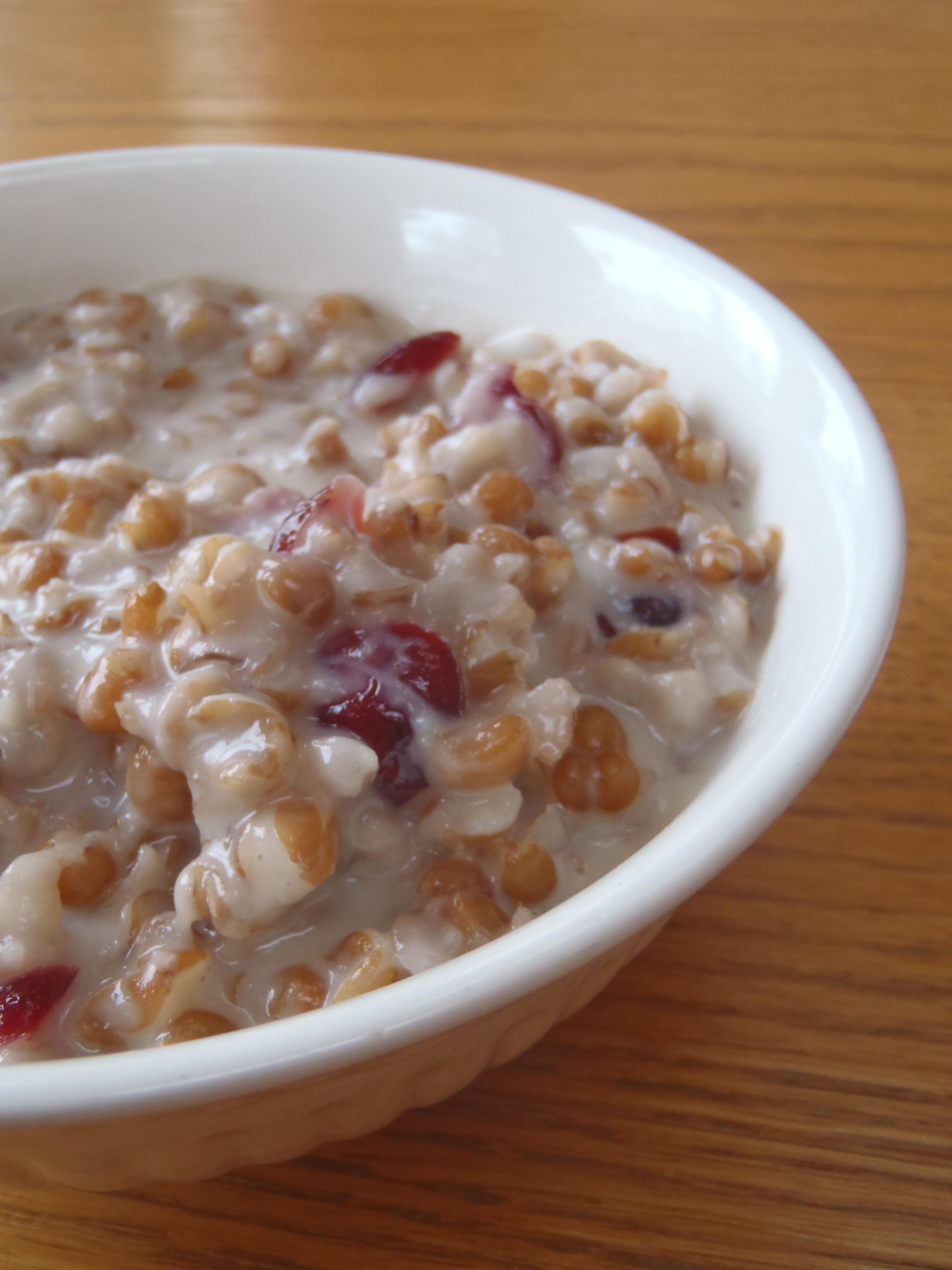 A bowl of wheat pudding, or kutia, with dried cranberries