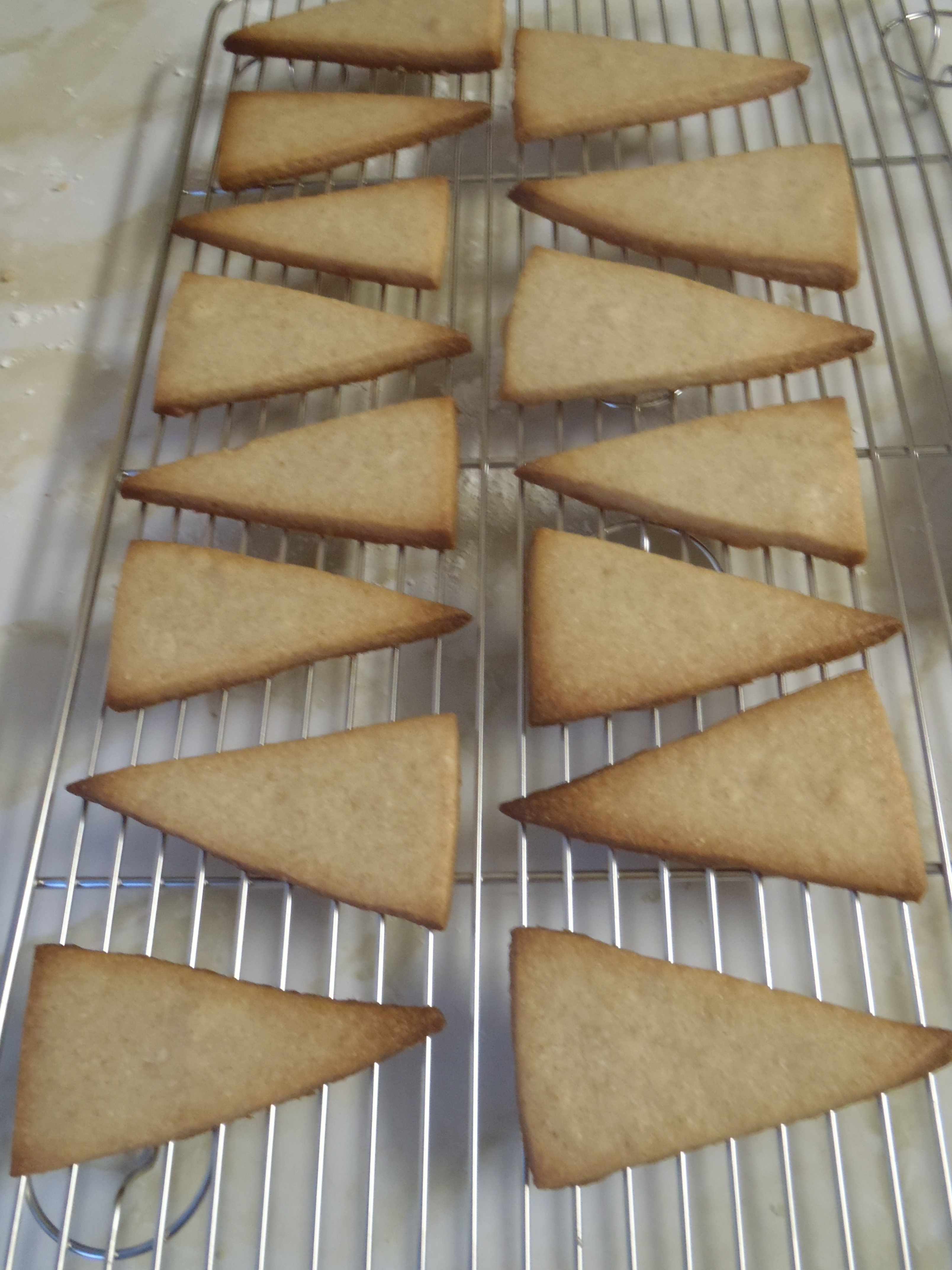A rack of shortbread cookies, cooling