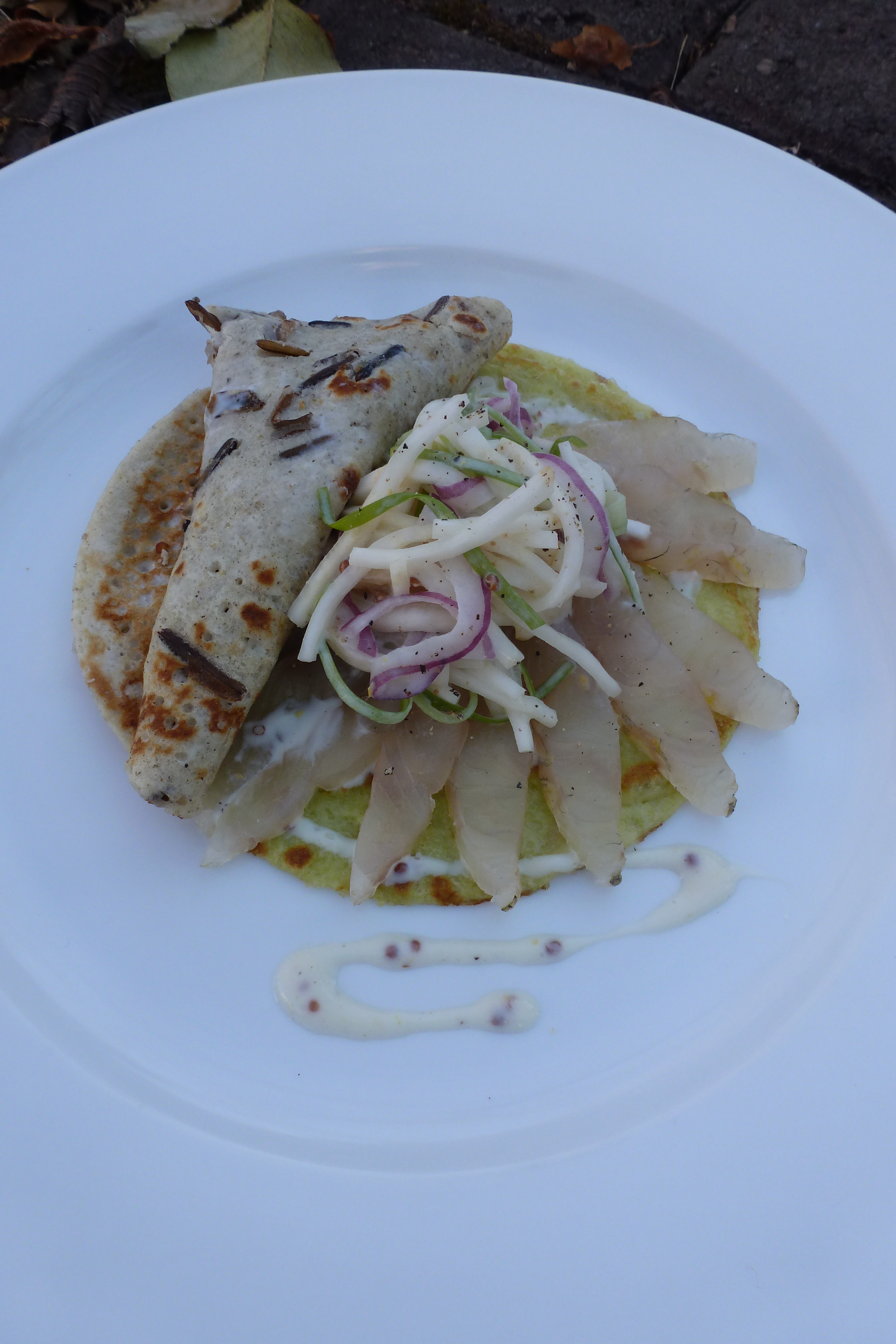 Smoked Pickerel, wild rice and green pea crepes, celery root slaw, grainy mustard dressing