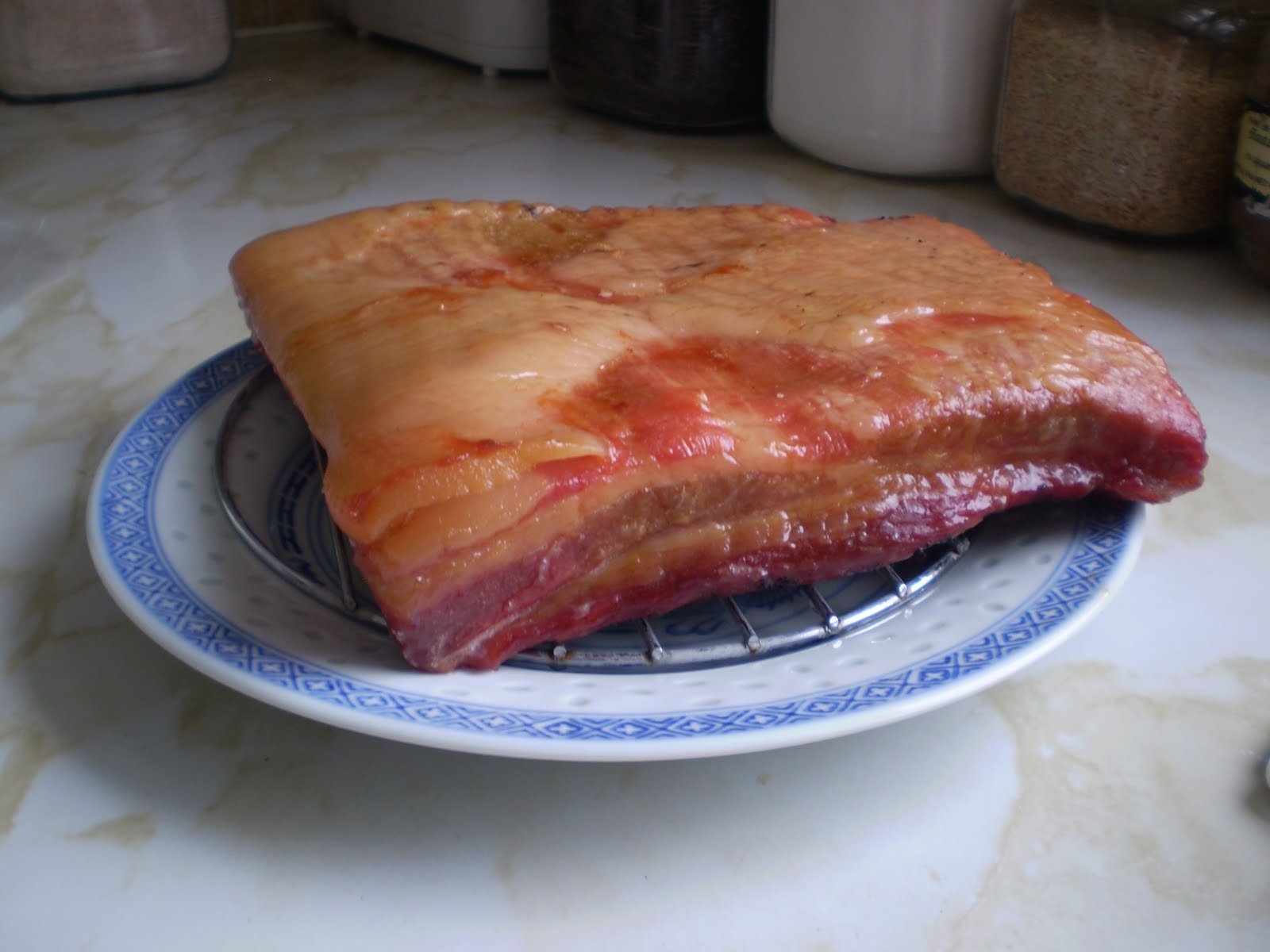 A slab of the finished bacon