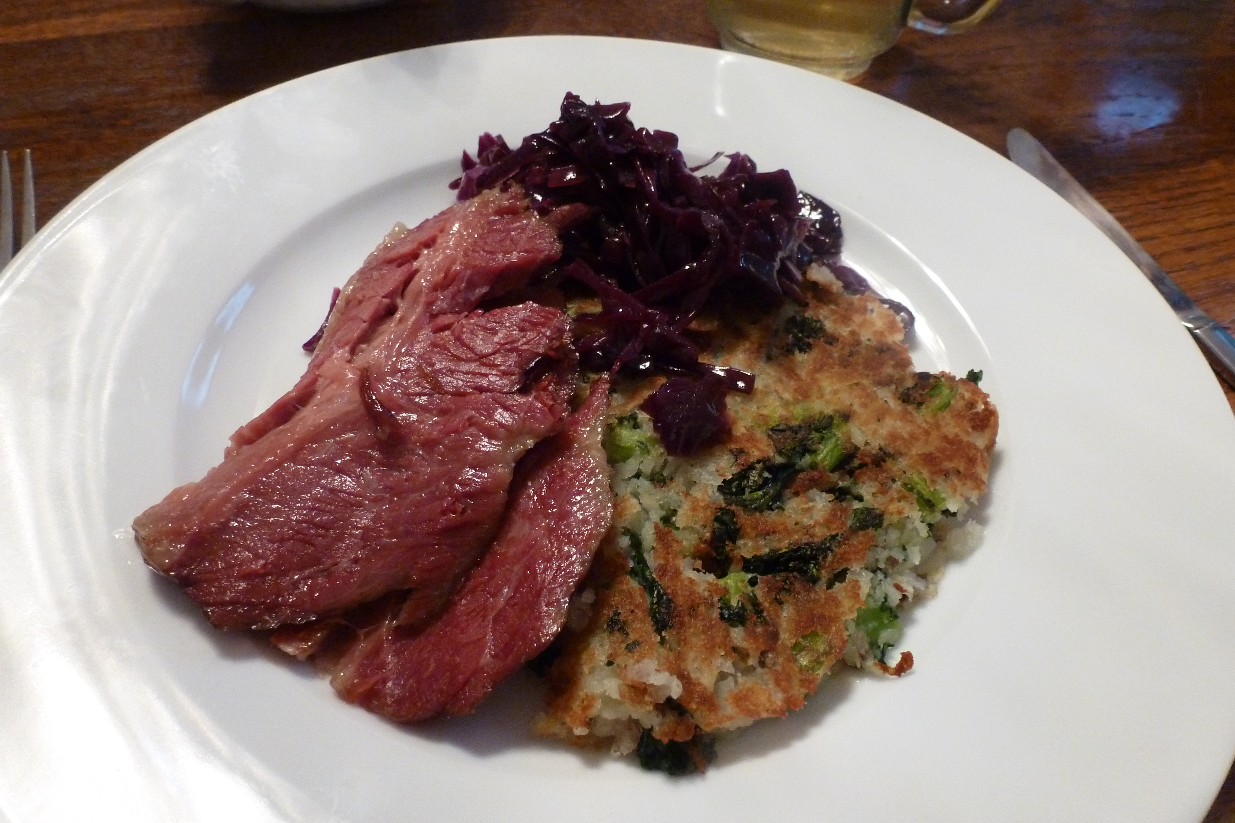 A plate for St. Patrick's Day: corned beef, colcannon, and cabbage