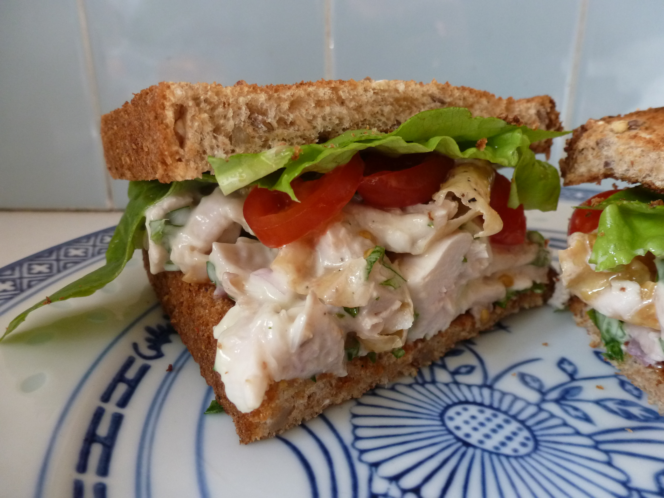 The finished chicken salad on toast, with tomatoes and lettuce