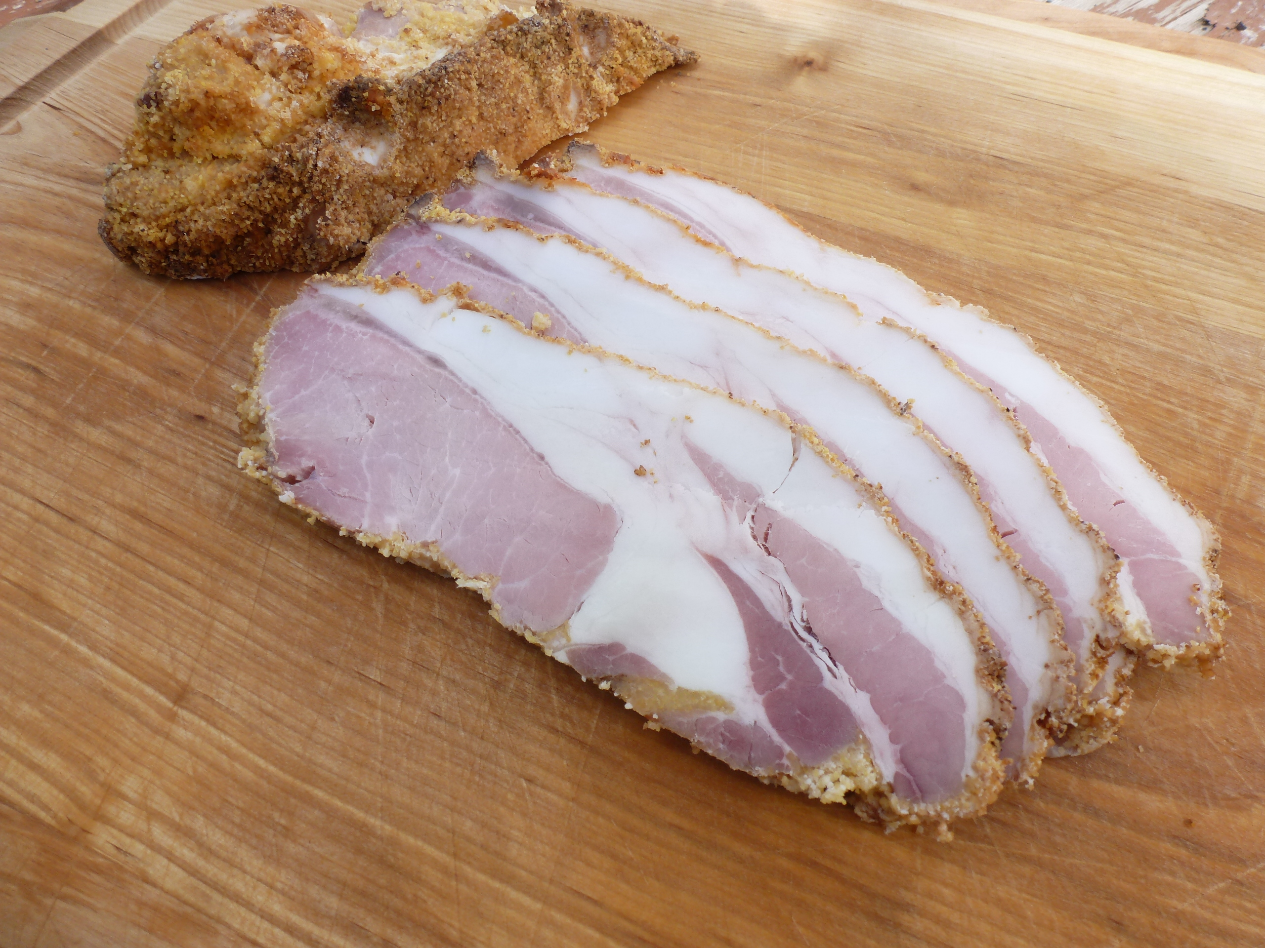 Slices of homemade peameal bacon