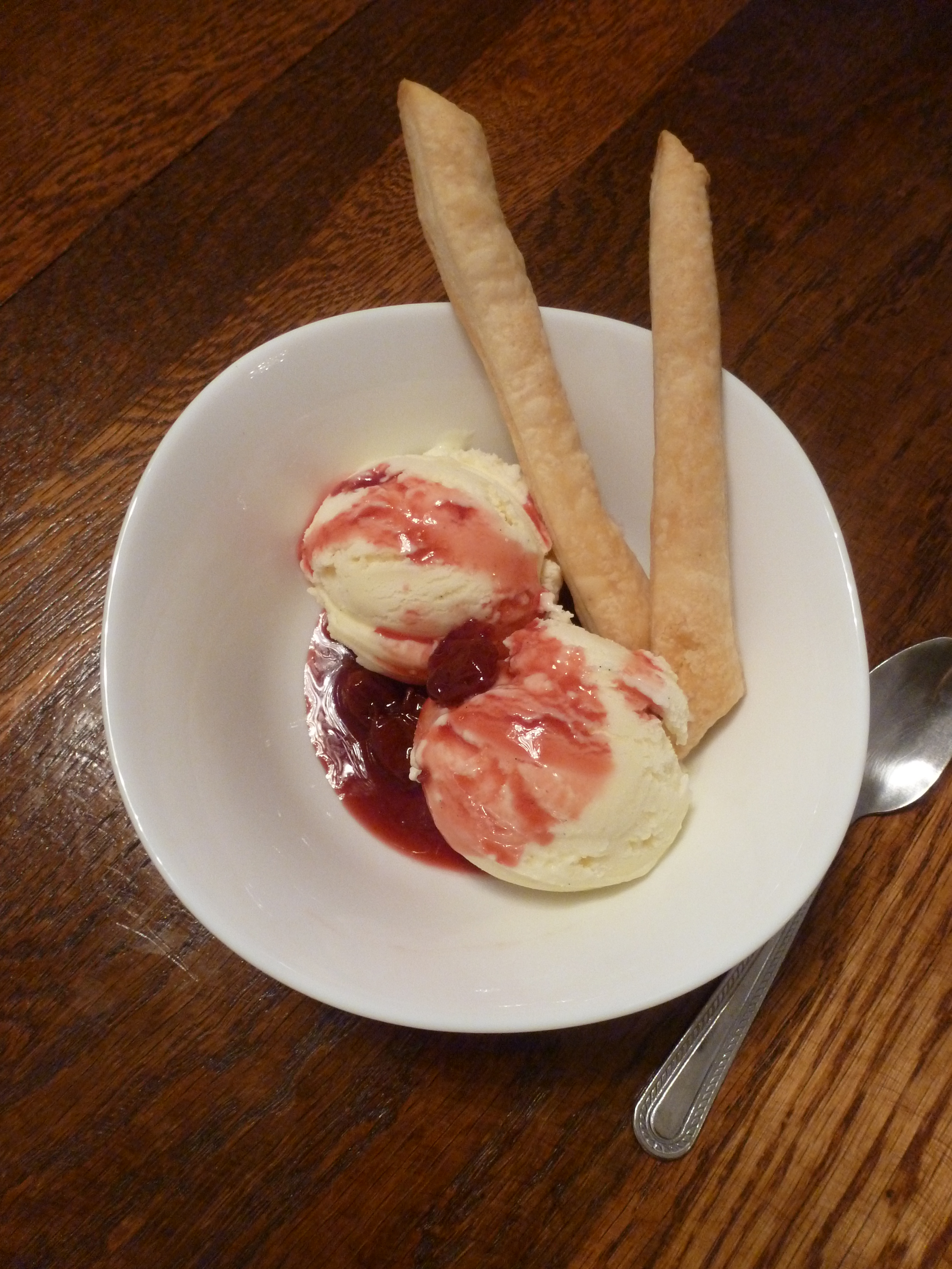 Vanilla ice cream, sour cherries, and pie sticks