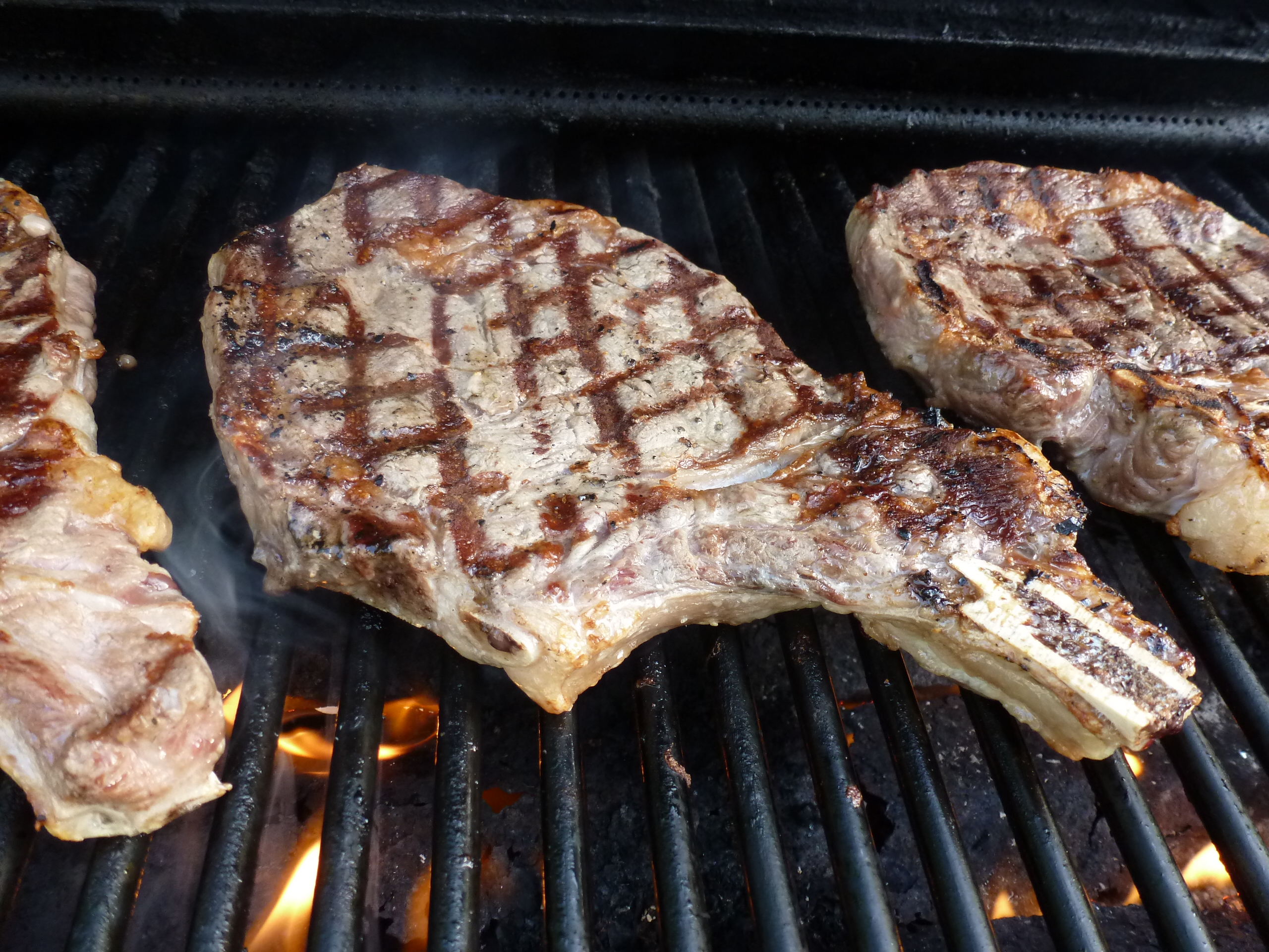 Rib steaks on the grill