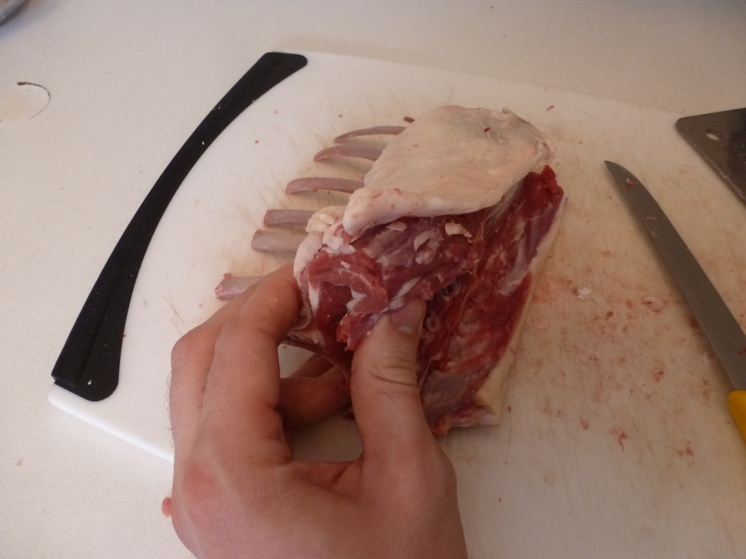 Exposing the chine bone on a lamb rack