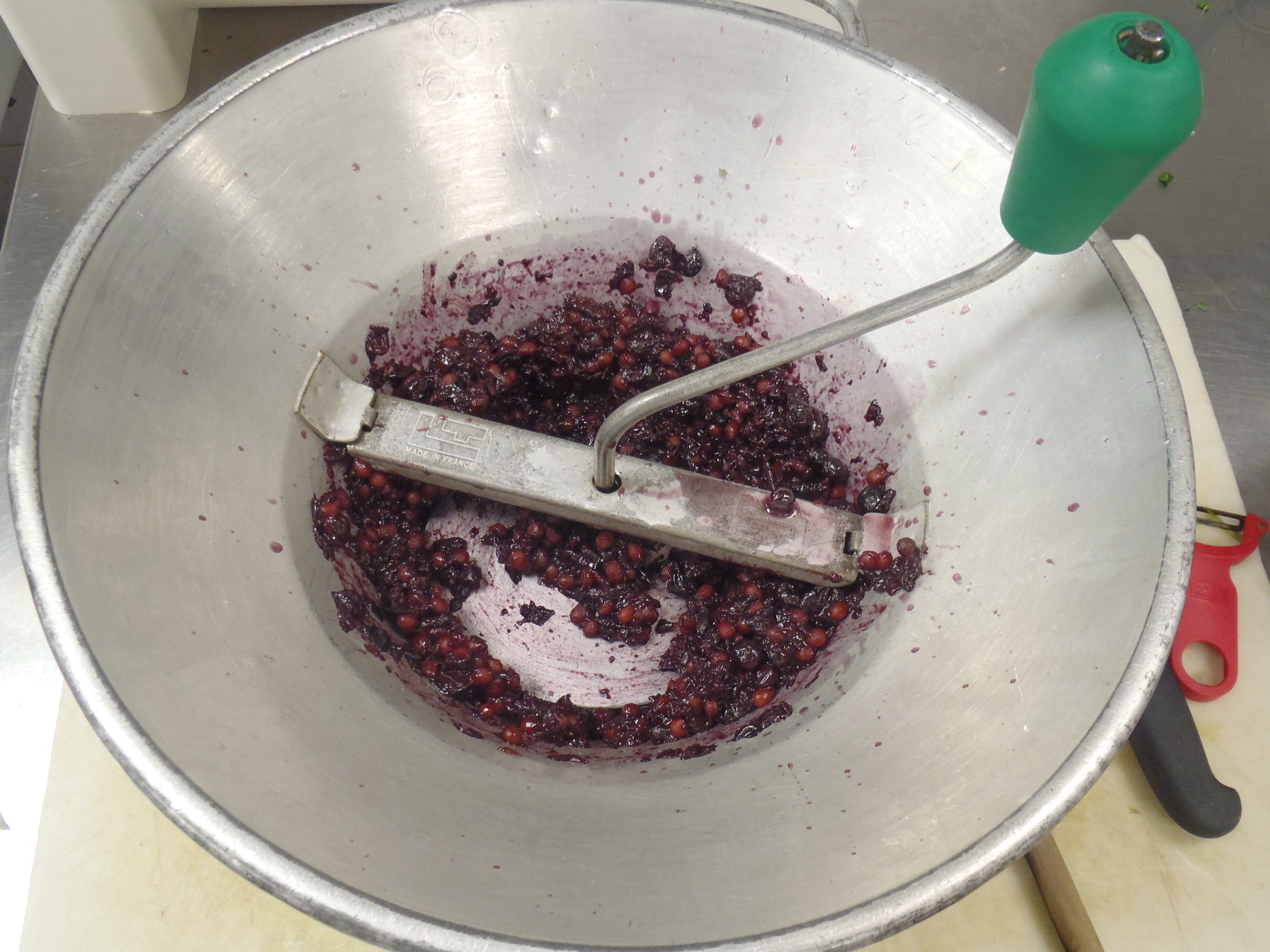 Milling chokecherries to remove the pits