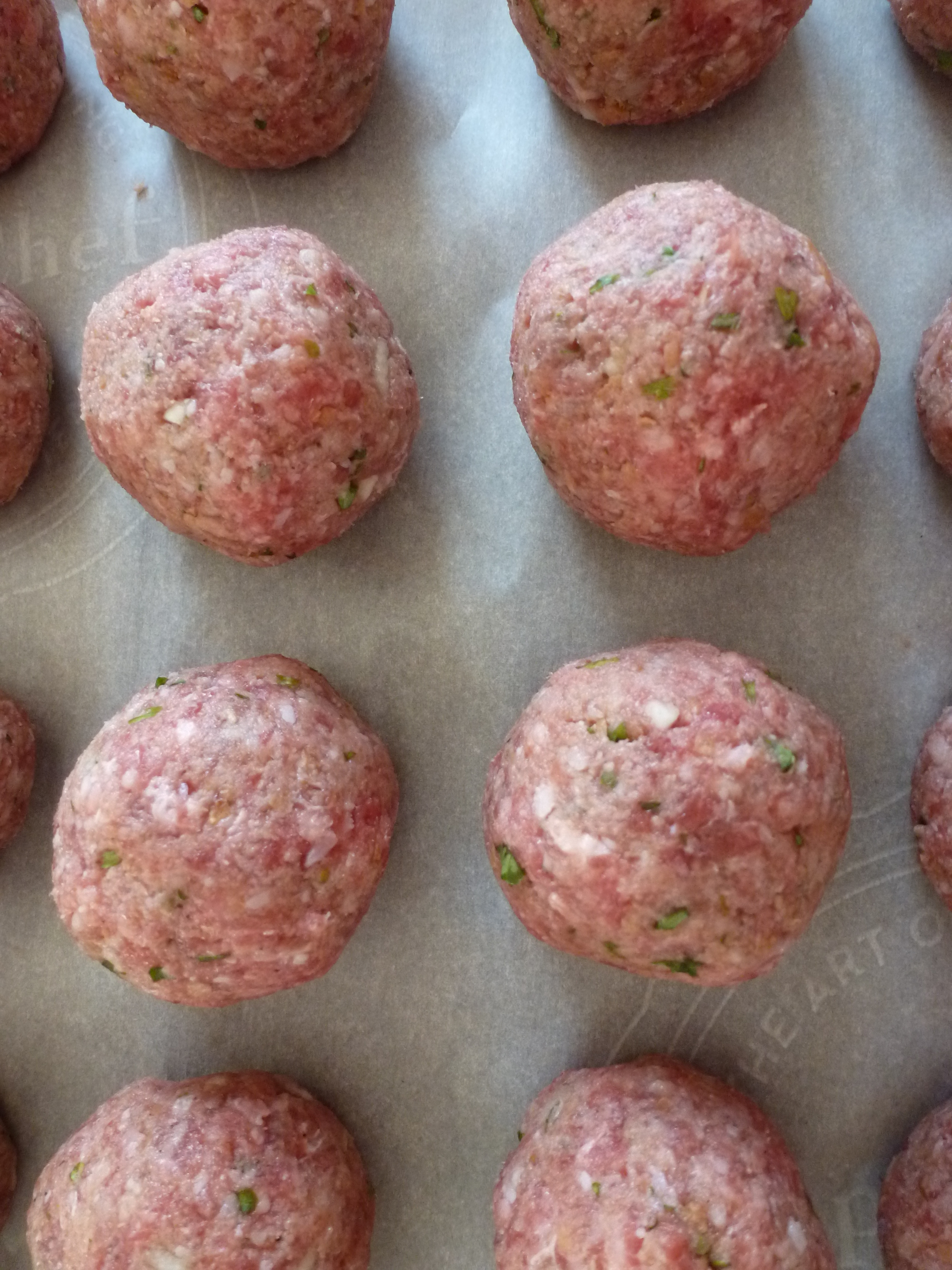 Raw meatballs, ready for the oven