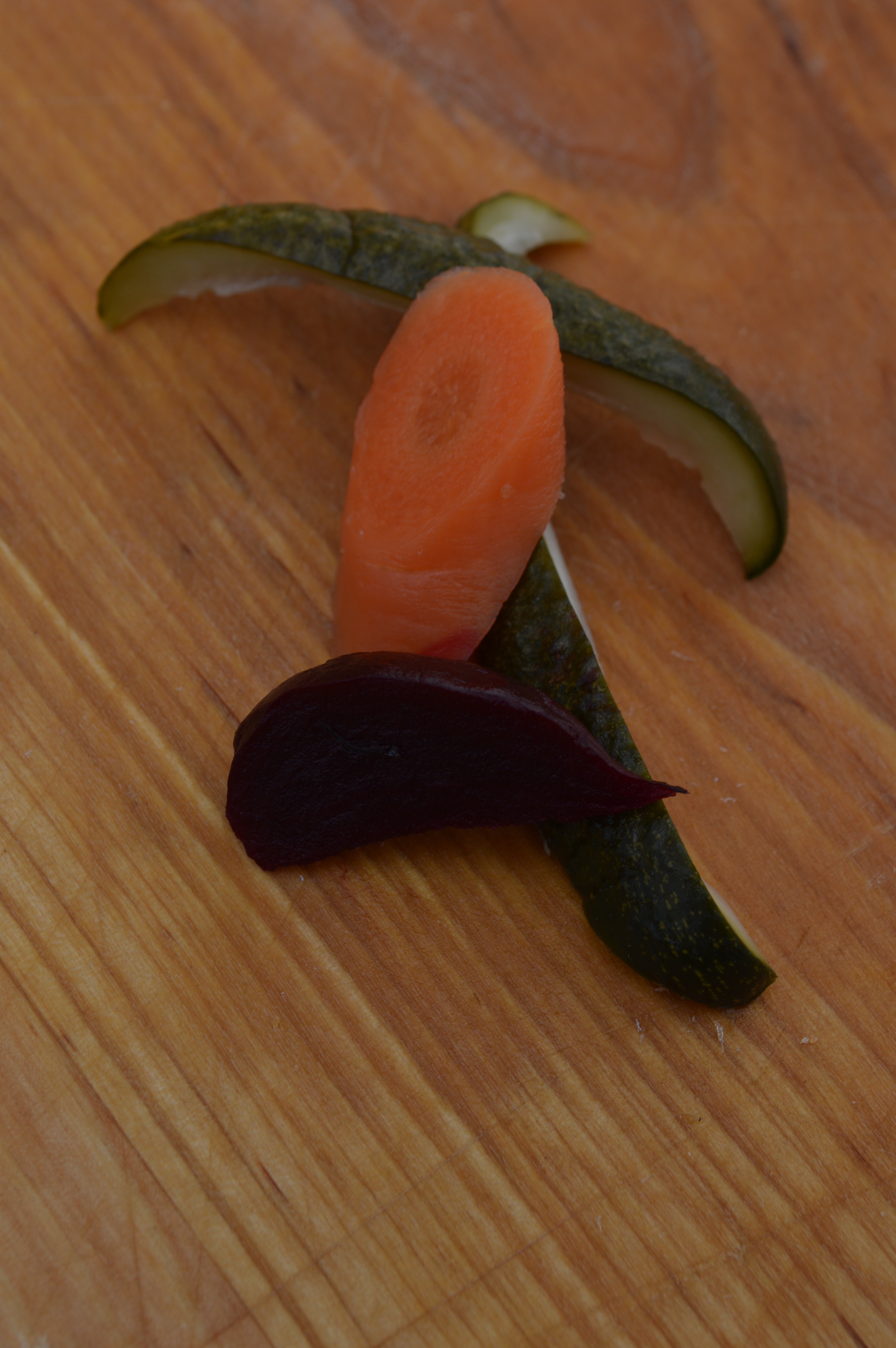 Quick-pickled cucumbers, carrots, and beets.