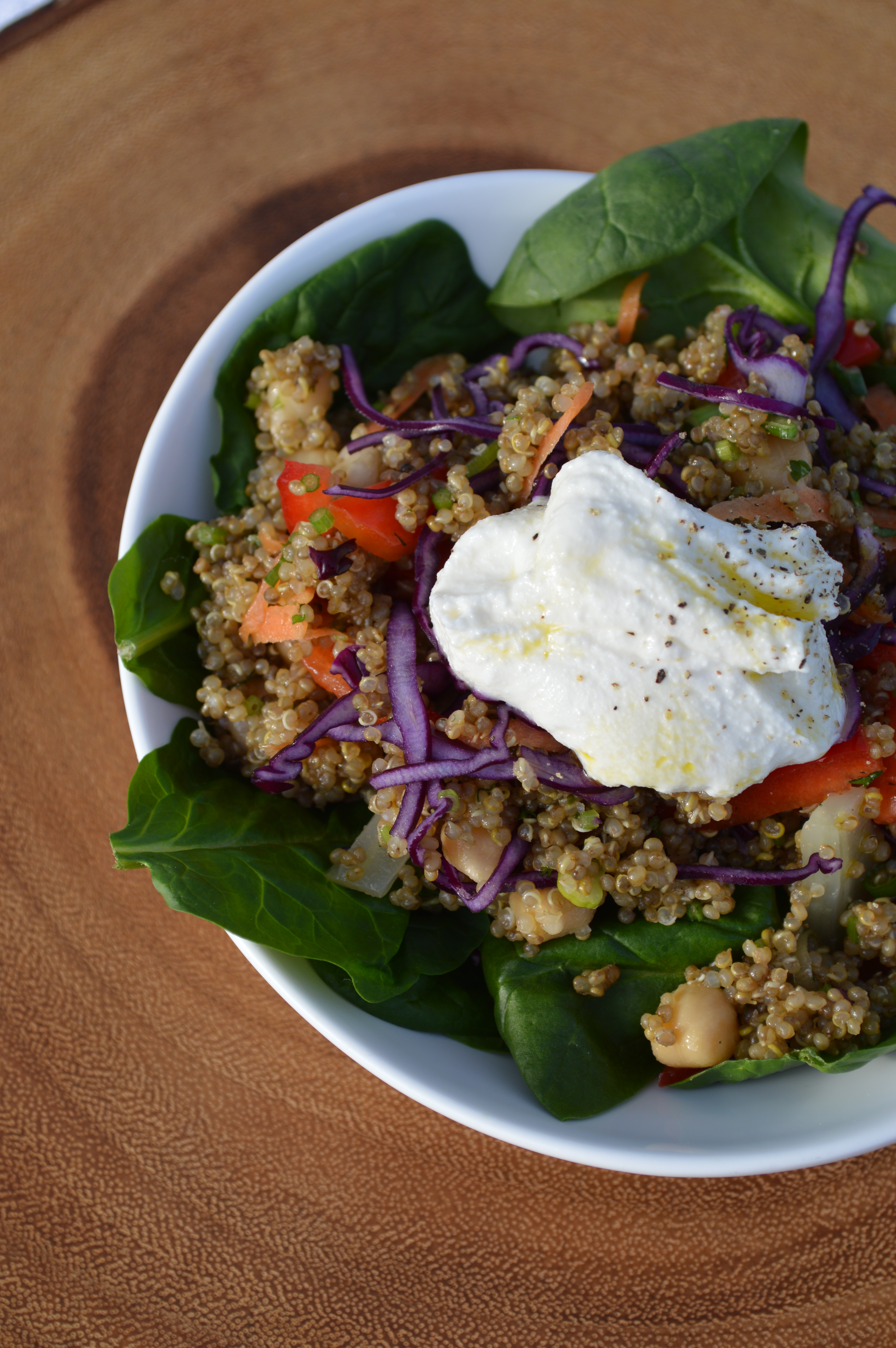 A bowl of quinoa salad.