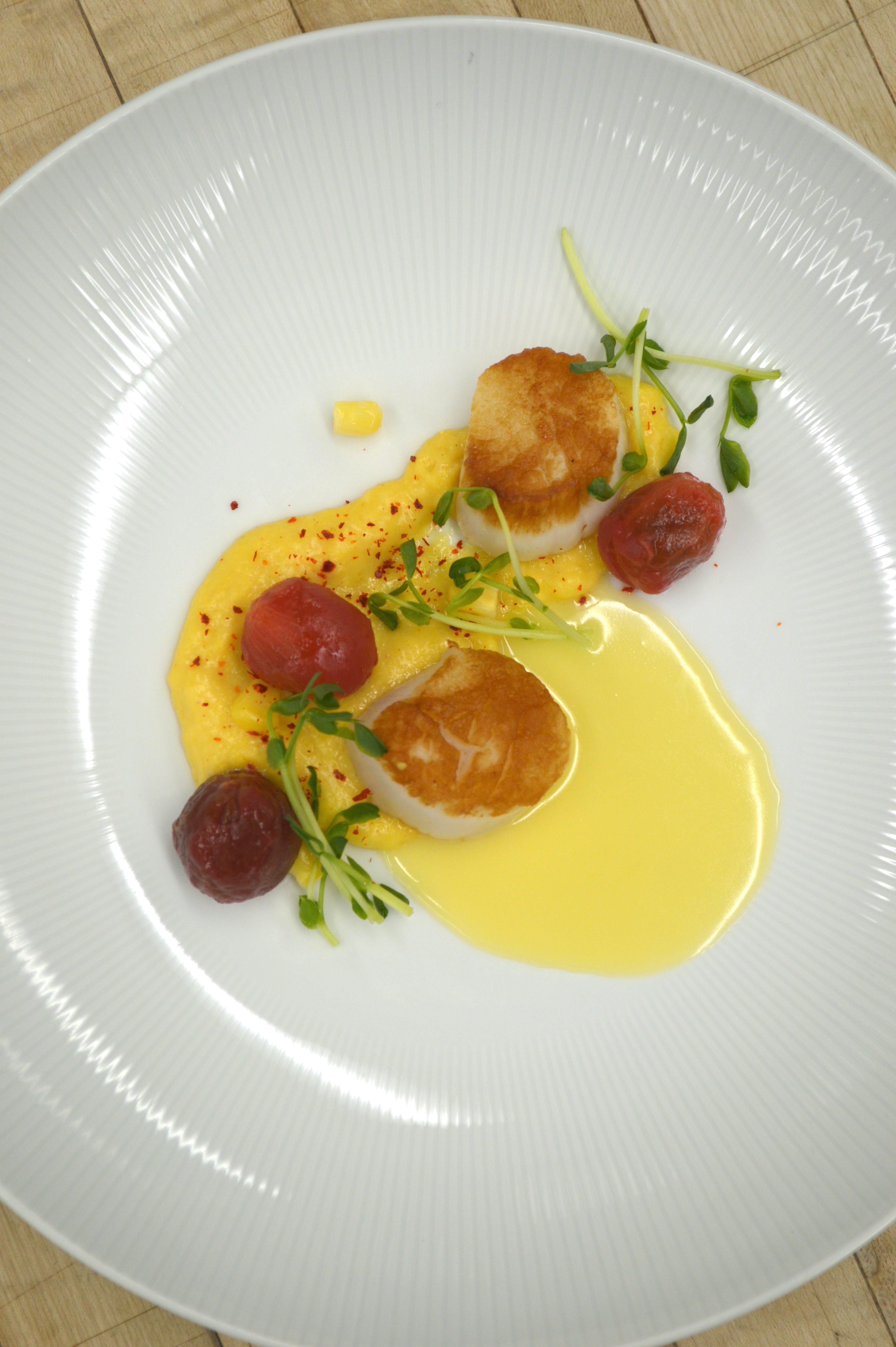 Seared scallops with a white chocolate beurre blanc.